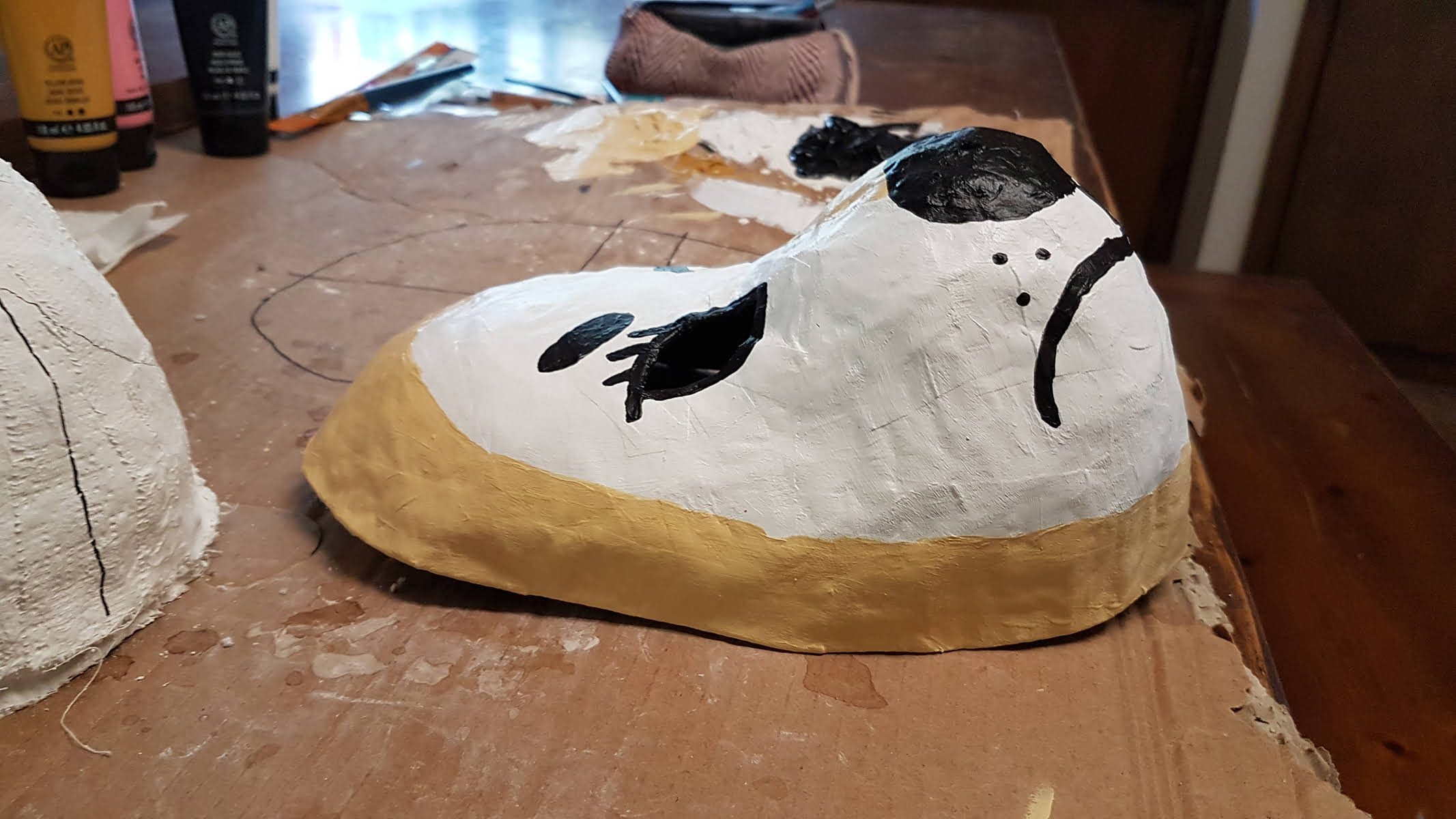 Mask, papier-mache and acrylic, 2023
