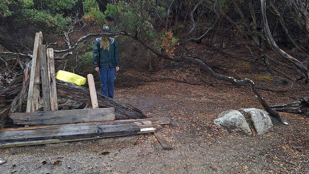 Ben behind a tree at the Johnny Souey campsite
