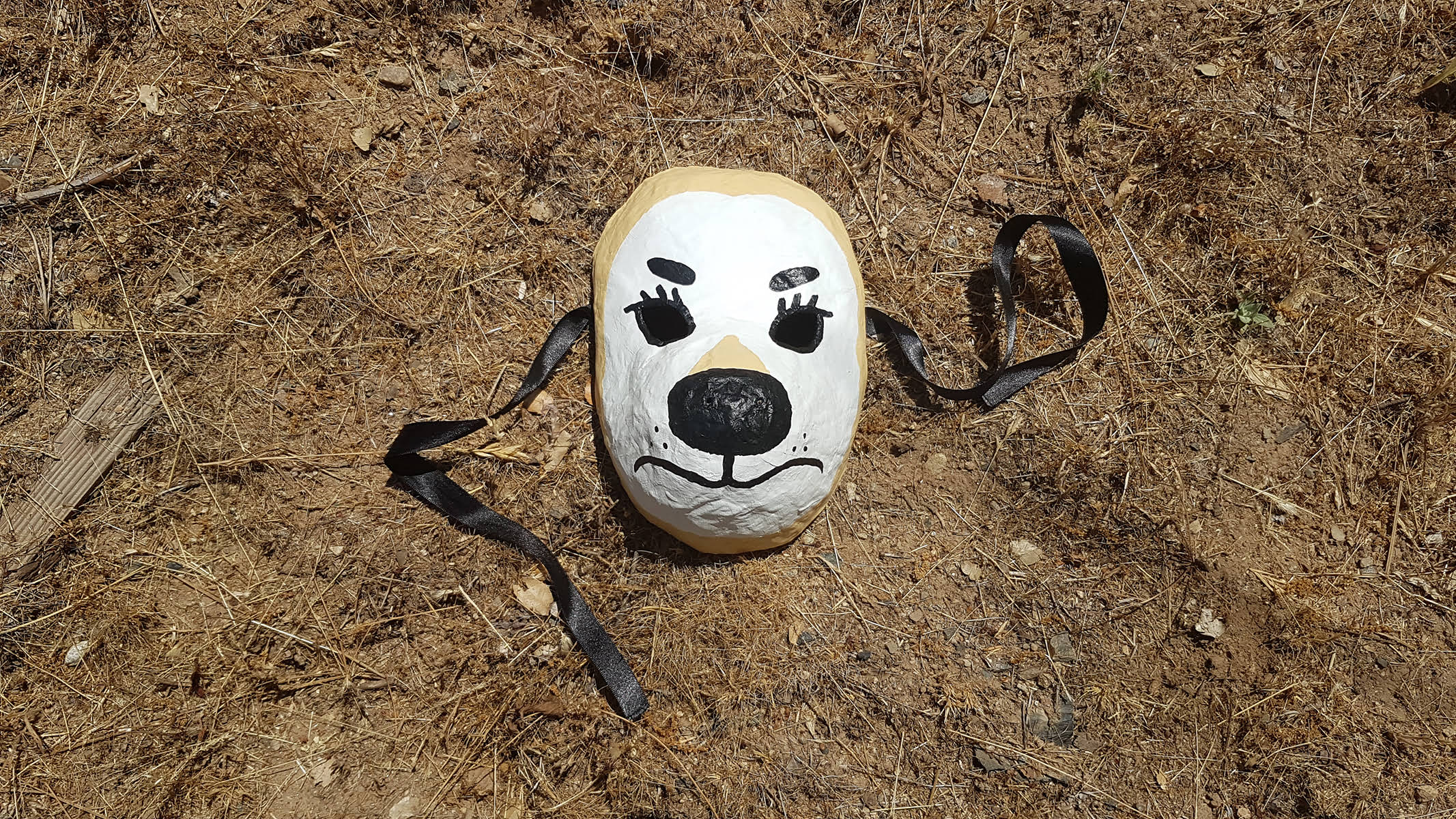 Mask, papier-mache and acrylic, 2023