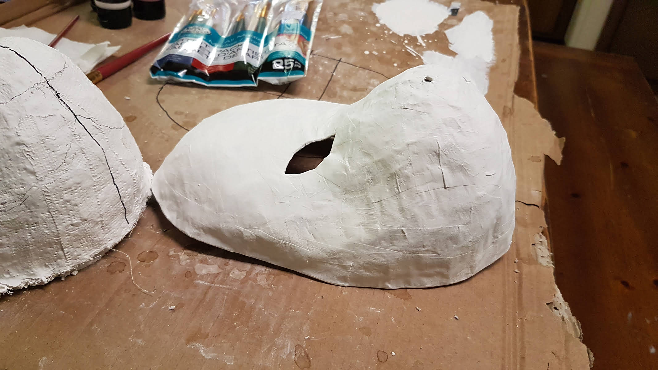 Mask, papier-mache and acrylic, 2023